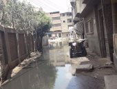 بالصور.. الصرف الصحى يغرق شوارع قرية عياش فى الغربية