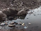 بالصور.. الصرف الصحى يجتاح شارع حسين يوسف فى الأميرية