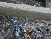 شكوى من تراكم القمامة بشارع "دنا" فى الإسكندرية