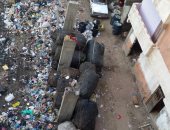 بالصور.. شارع النصر بالإسكندرية تغطيه كتل من القمامة رغبة فى إعادة تدويرها