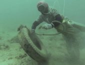 بالصور.. شخصيات سياسية ودينية "تتظاهر" تحت الماء فى الفلبين