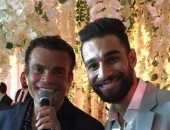 بالصور.. شاهد صور نجوم الأهلى مع الهضبة فى حفل زفاف رمضان صبحى