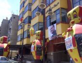 بالصور.. الأعلام المصرية وصور الرئيس السيسى تزين مبانى ومدخل بورسعيد