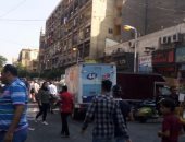 إضاءة أعمدة الكهرباء نهارًا فى شارع محمد على بالعتبة رغم دعوات الترشيد