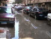 بالصور.. غرق شارع عمارات الشروق بالجيزة فى مياه الصرف الصحى