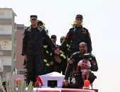 بالصور.. الطفل ياسين نجل الشهيد أحمد عبد الفتاح يتقدم الجنازة العسكرية لوالده بقنا