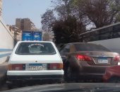 رفع 12 سيارة ودراجة بخارية مهملة فى حملات مرورية بشوارع الجيزة
