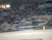 بالصور.. القمامة تحاصر سكان شارع عرابى بأم بيومى فى شبرا الخيمة