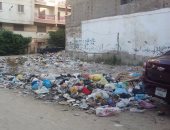 قارئ يشكو من انتشار القمامة بشوارع العجمى فى الإسكندرية