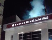 بالصور.. السيطرة علي حريق محدود على "سطح" بنك مصر بمدينة الأقصر