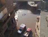 بالصور.. غرق شارع المعهد الدينى فى الوراق بمياه الصرف الصحى