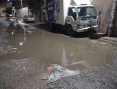 بالصور ..مياه الصرف تغرق شارع الشبان بمدينة بنى سويف بعد تسربها من إحدى الغرف 