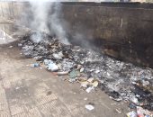 قارئ يشكو تراكم القمامة بجانب سور المصل واللقاح فى المهندسين