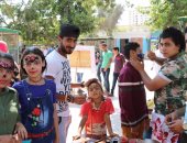 بالصور.. أطفال كفر الشيخ يحتفلون بالعيد فى الحدائق العامة بالرسم على وجوههم