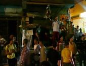 بالفيديو.. احتفالات أهالى أرض اللواء بعد نقل آخر جثتين من جثث الإرهابيين