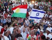 بالصور..أكراد العراق يستفزون العرب برفع علم إسرائيل فى مسيرة داعمة للانفصال
