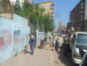 بالصور.. نظافة الجيزة تكثف حملاتها حول المدارس استعدادا للعام الدراسى