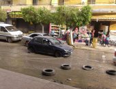 بالصور.. شارع أحمد لطفى بالجيزة يغرق فى مياه الصرف
