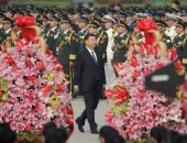 بالصور..الصين تحتفل بيوم الشهداء بوضع أكاليل الزهور على النصب التذكارى