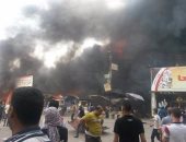 بالصور.. الحماية المدنية تسيطر على حريق بمحول كهرباء قبل انفجاره فى بنها