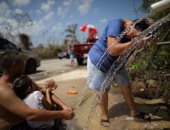 بالصور.. الحياة تعود إلى طبيعتها فى بورتوريكو وسط دمار إعصار "ماريا"