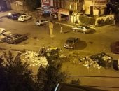 شكاوى من انتشار القمامة بشارع دمشق فى مصر الجديدة