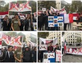 لافتات المحتجين أمام اليونسكو تفضح شراء المرشح القطرى للأصوات