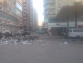 قارئ يشكو تراكم القمامة فى ميدان الملكة بشارع العشرين بفيصل 