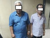 الأموال العامة تضبط عملات أجنبية بحوزة تاجرين قبل بيعها بالسوق السوداء