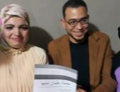 عروسان بأسيوط يوقعان على استمارة "علشان تبنيها" لدعم ترشح السيسي