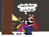 اللصوص يحلمون بسرقة الملابس الشتوية فى كاريكاتير ساخر لليوم السابع