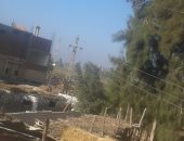 بالصور.. الأسلاك الكهربائية تهدد حياة أهالى قرية شاويش بالشرقية