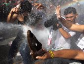 صور.. تظاهرات بالأحذية فى الفلبين احتجاجا على زيارة ترامب