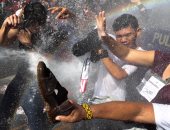 تظاهرات بالأحذية فى الفلبين احتجاجا على زيارة ترامب