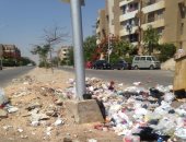قارئ يشارك بصور تدهور الحى 11 بأكتوبر وانتشار القمامة