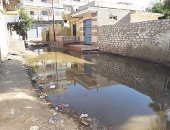 مياه الصرف الصحى تغرق شارع الملكة بفيصل.. والأهالى يستغيثون