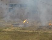 صور.. حرق مخلفات زراعية داخل مدرسة جرجا الثانوية بسوهاج