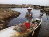 صور.. صيادو دمياط يطالبون باستكمال أعمال تطهير بحيرة المنزلة
