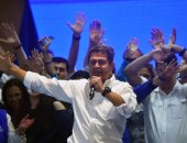 صور.. رئيس هندوراس خوان أورلاندو هيرنانديز يعلن فوزه بولاية جديدة