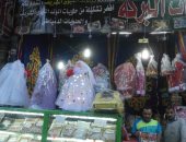 حلوى المولد الفاخرة بـ 80 والشعبى بـ 40 جنيه والسرادقات تجذب مواطنى بنى سويف