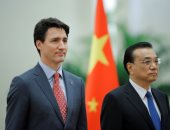 صور.. استقبال رئيس الوزراء الكندى فى الصين مع ركود محادثات التجارة