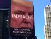 إعلانات سحب الثقة من ترامب تملأ ميدان "تايمز اسكوير" بأمريكا