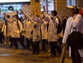 صور.. موظفو الرعاية الصحية فى بوليفيا يتظاهرون ضد سياسة الحكومة
