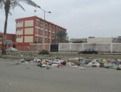 صور.. اضبط مخالفة.. القمامة تحاصر مدارس الزهور ببورسعيد