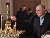 صور.. الرئيس الروسى يحضر احتفالات عيد الميلاد فى كنيسة القديسين