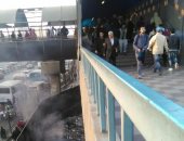 قارئ يشكو حرق القمامة أسفل كوبرى شبرا الخيمة داخل حرم السكة الحديد