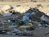 بالصور.. القمامة تجتاح شوارع قرية ذات الكوم فى الجيزة والأهالى يشكون