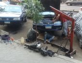 ورشة إصلاح سيارات داخل الكتلة السكنية فى عين شمس تثير غضب الأهالى