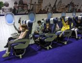 صور.. مصر للطيران تعلم الأطفال قواعد السفر على متن طائرة