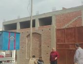 صور .. حملة لصيانة أعمدة الإنارة بالمنطقة الصناعية بالخانكة